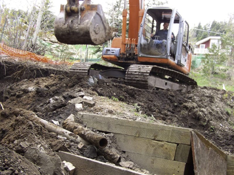 Digging to make room for lower lever add on, on Park City Home