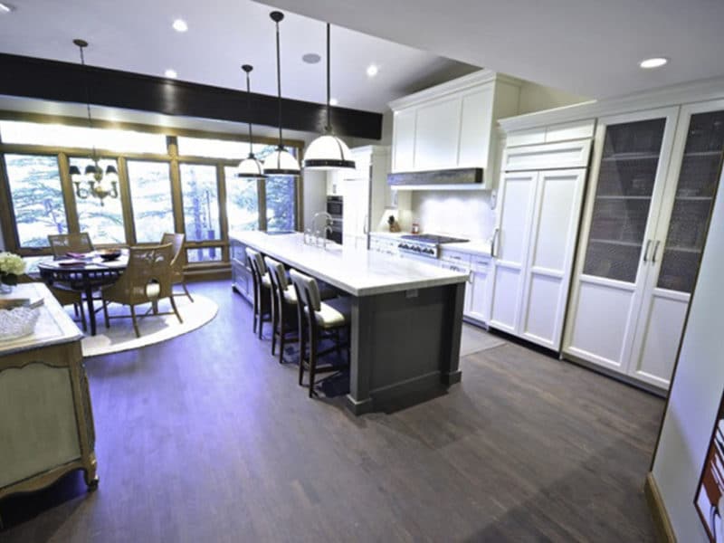 Kitchen hardwood floors, lighting, and cabinet installation