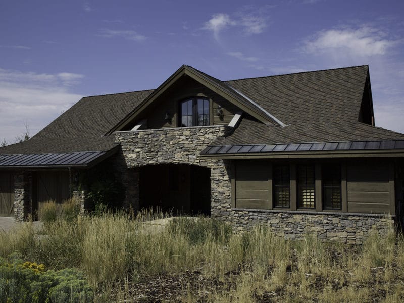 Stone remodel of exterior home front view