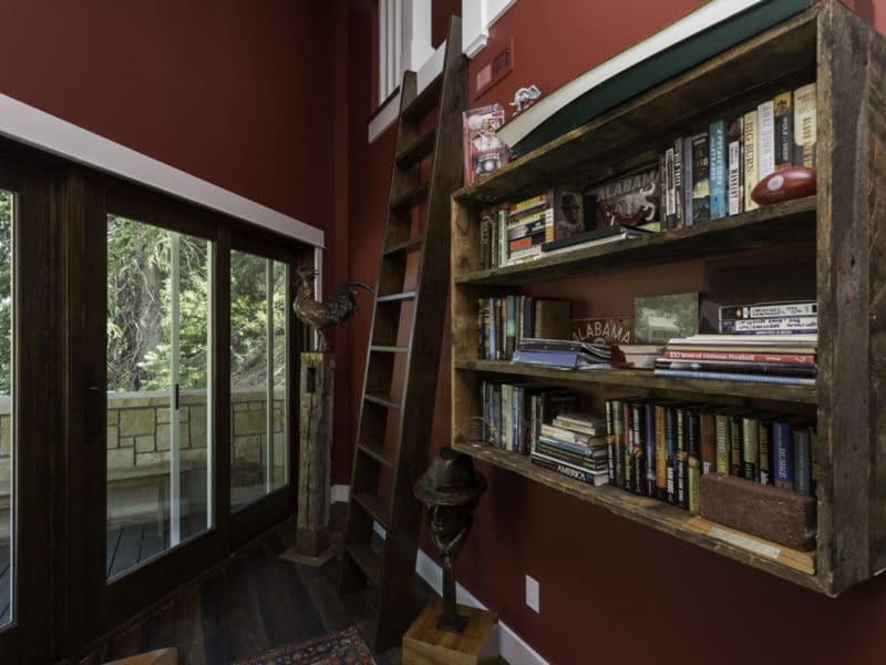 Remodeled loft mini library with new glass doors