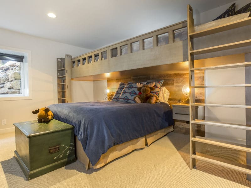 Basement bedroom with top bunk built in 3