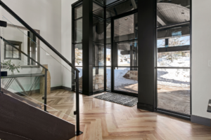 Side view of home's entry way with black wood