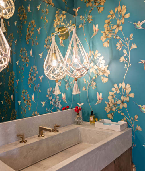 Custom bathroom countertop with floral wallpaper