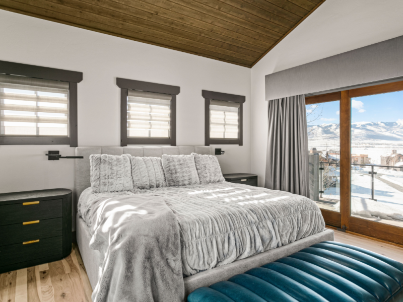 Custom bedroom with new bed and window lighting