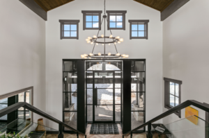 Home's entryway with light hanging above