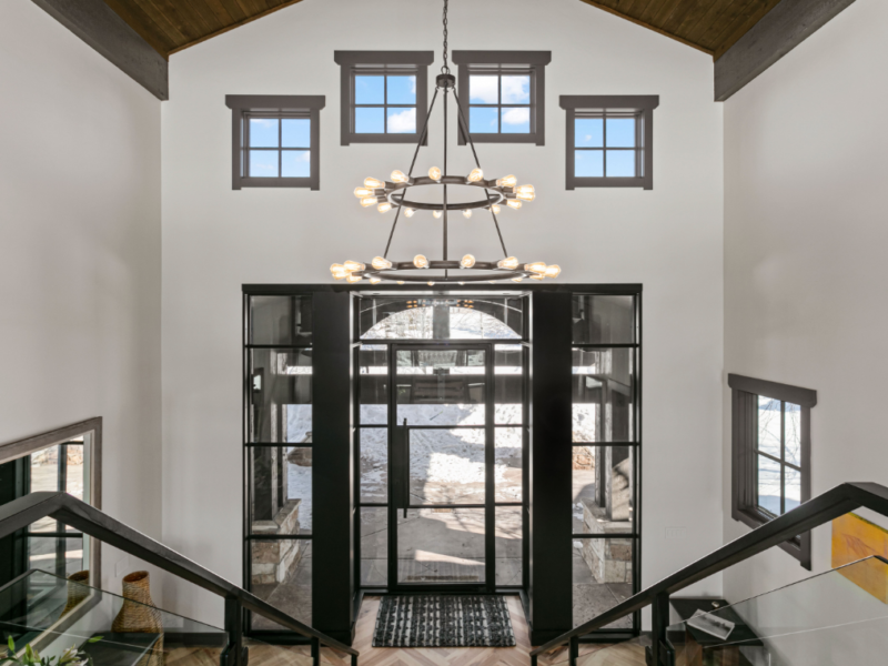 Home's entryway with light hanging above