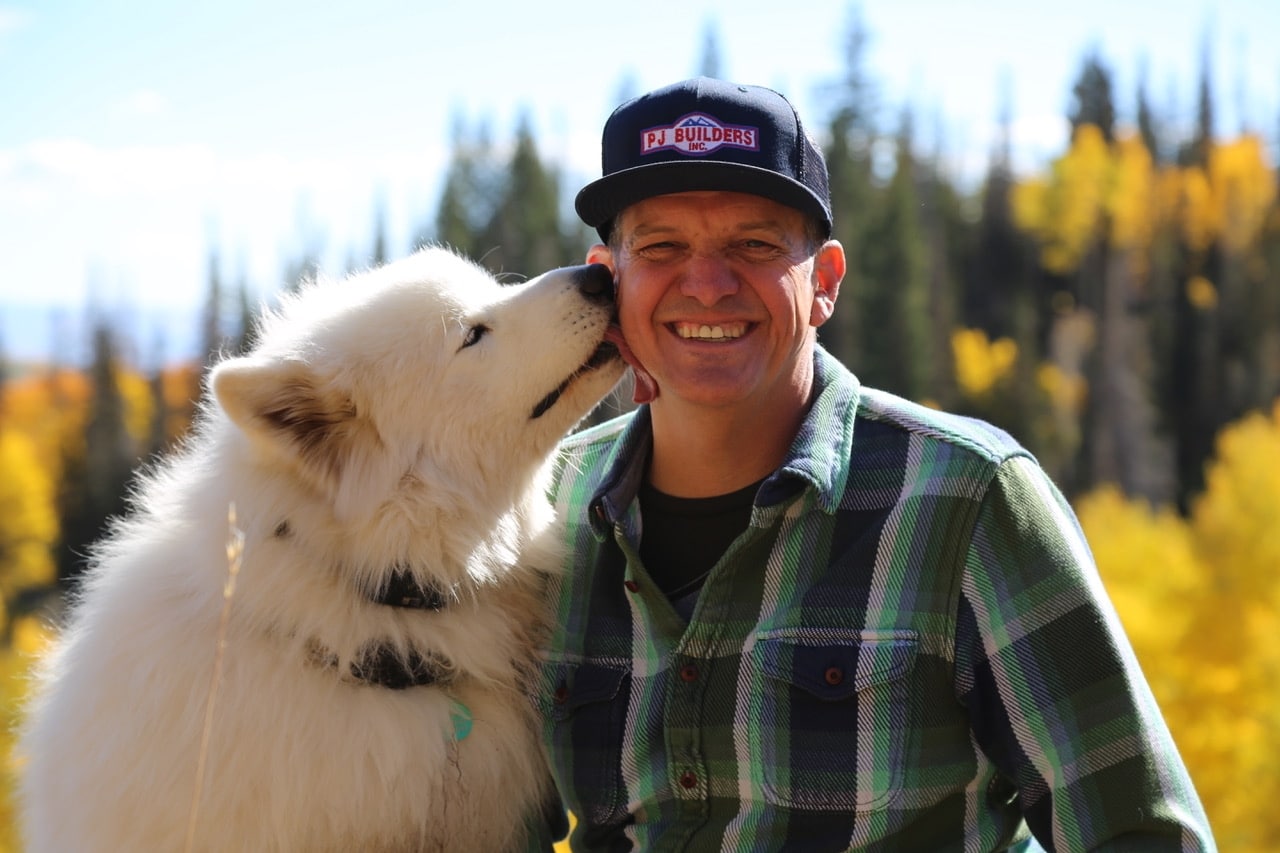 Pete Olson, founder of PJ Builders, and his dog
