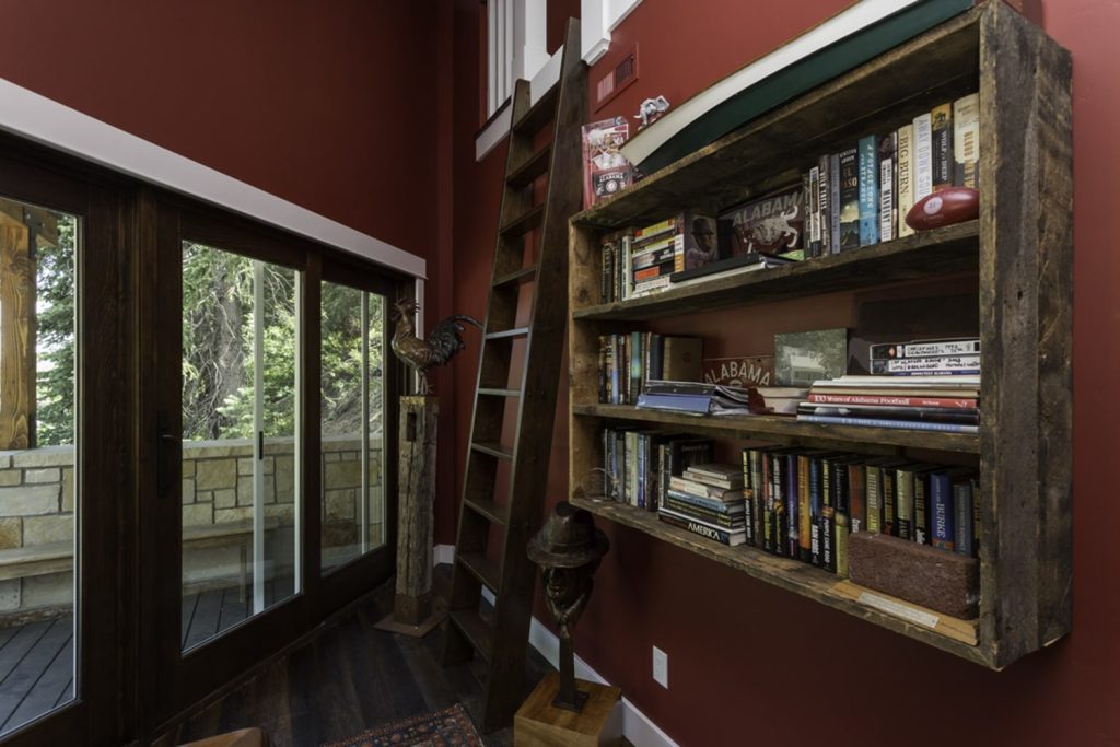 Remodeled loft mini library with new glass doors
