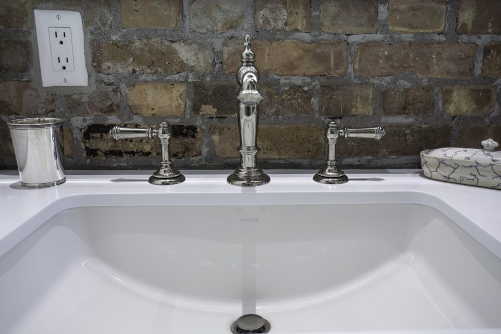 Newly constructed sink with custom brick wall in Park City Utah